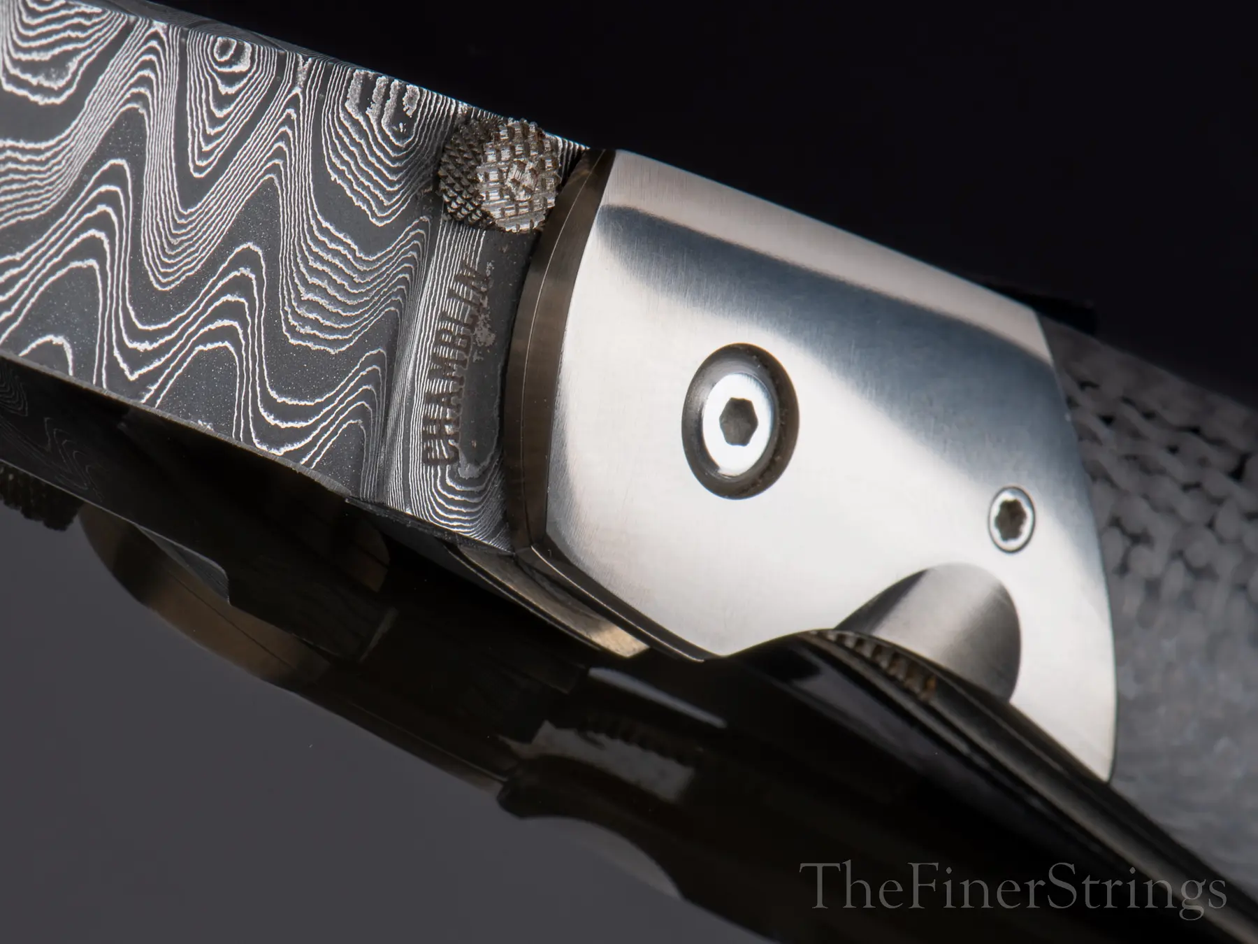 Bolster and thumb stud — CHAMBLIN stamp detail
