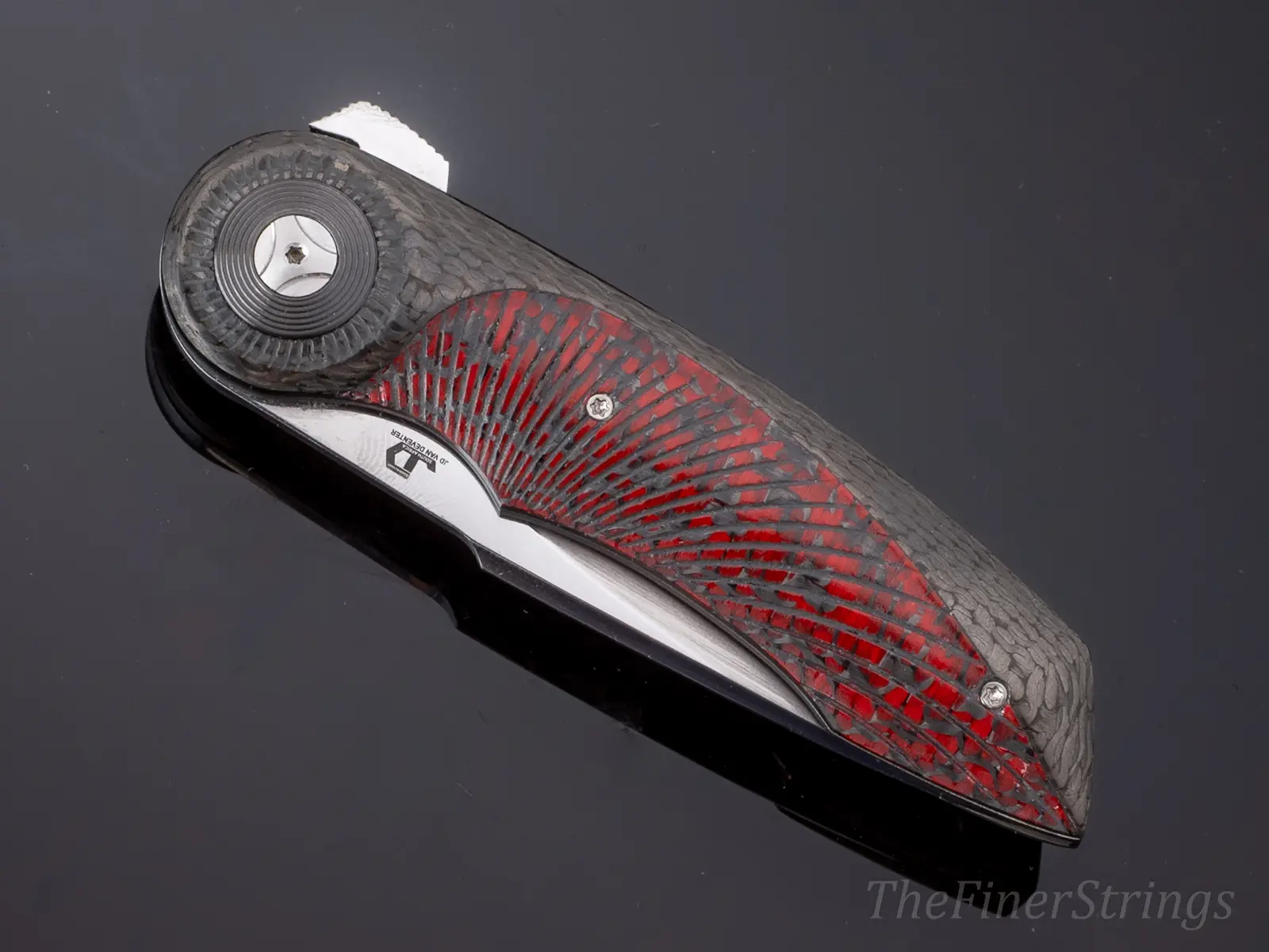 Closed — red carbon, full show side