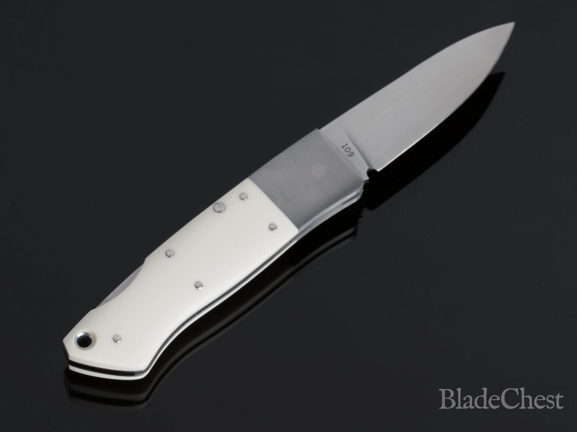 Jess Horn mammoth ivory lockback &mdash; satin drop-point blade, full length