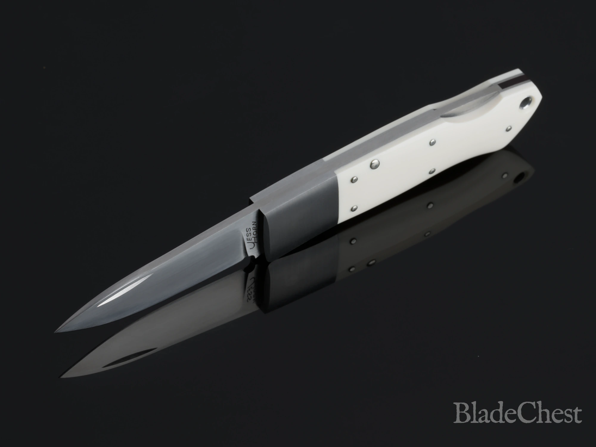 Jess Horn mammoth ivory lockback &mdash; open, standing on the point
