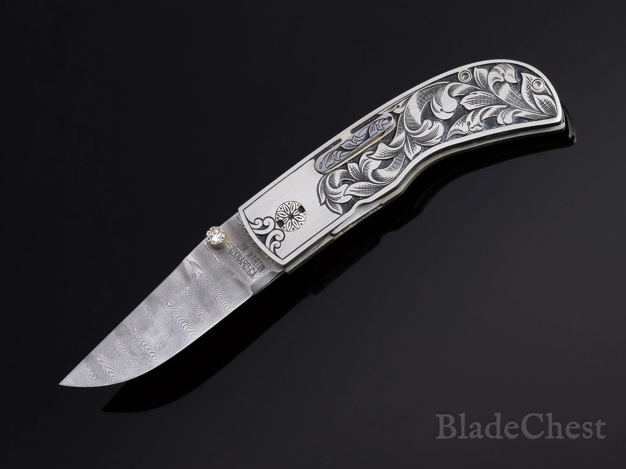 Jim Martin engraved automatic &mdash; open, blade down-left
