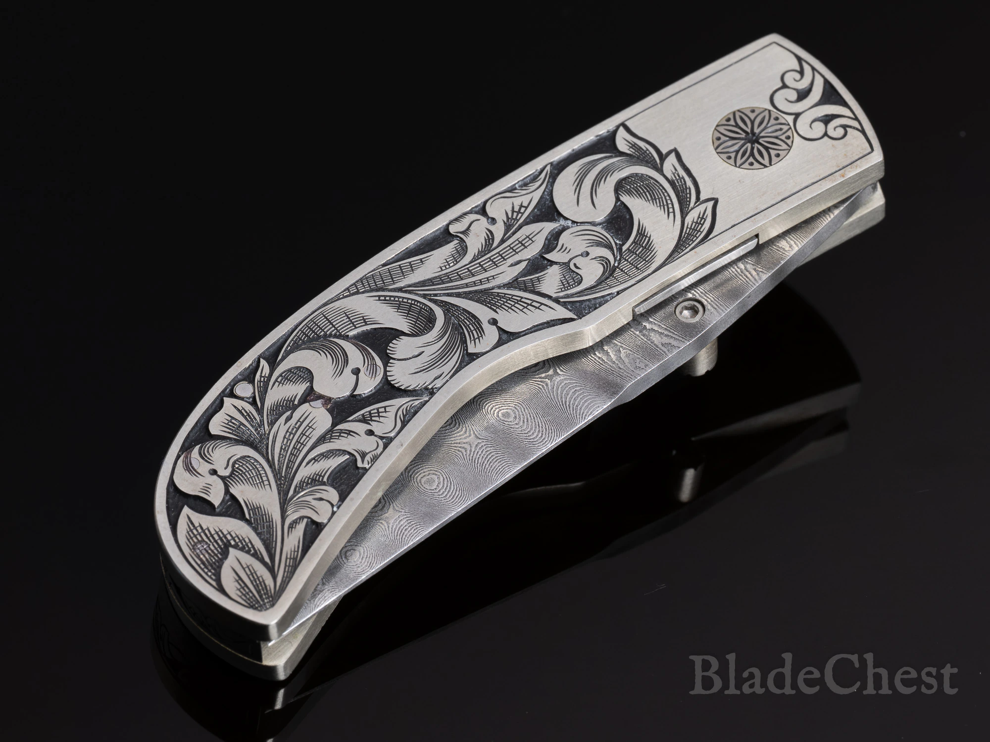 Jim Martin auto &mdash; scroll engraving, three-quarter