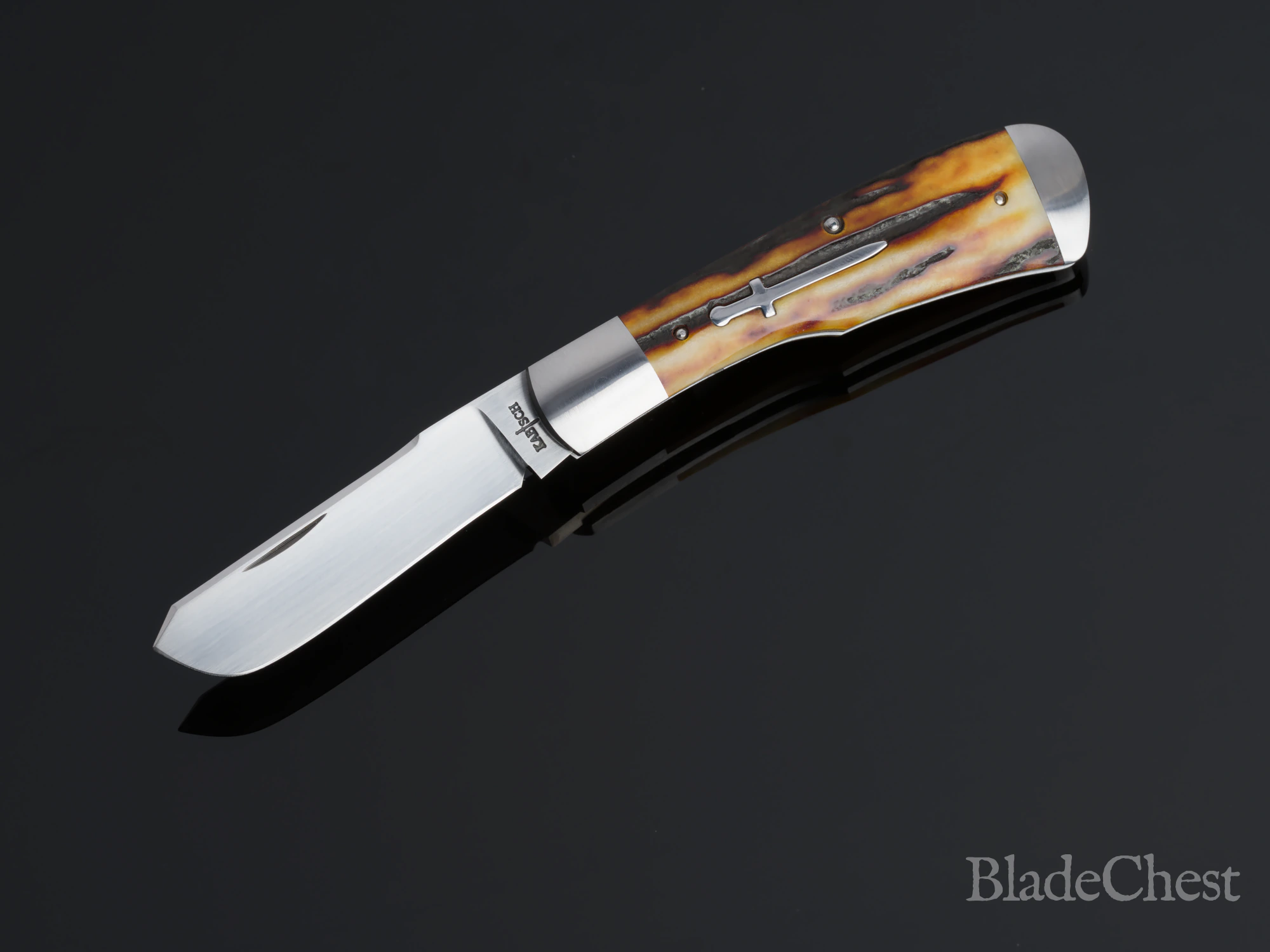Ben Kabisch Gunstock Stag &mdash; open, blade down-left, escutcheon side