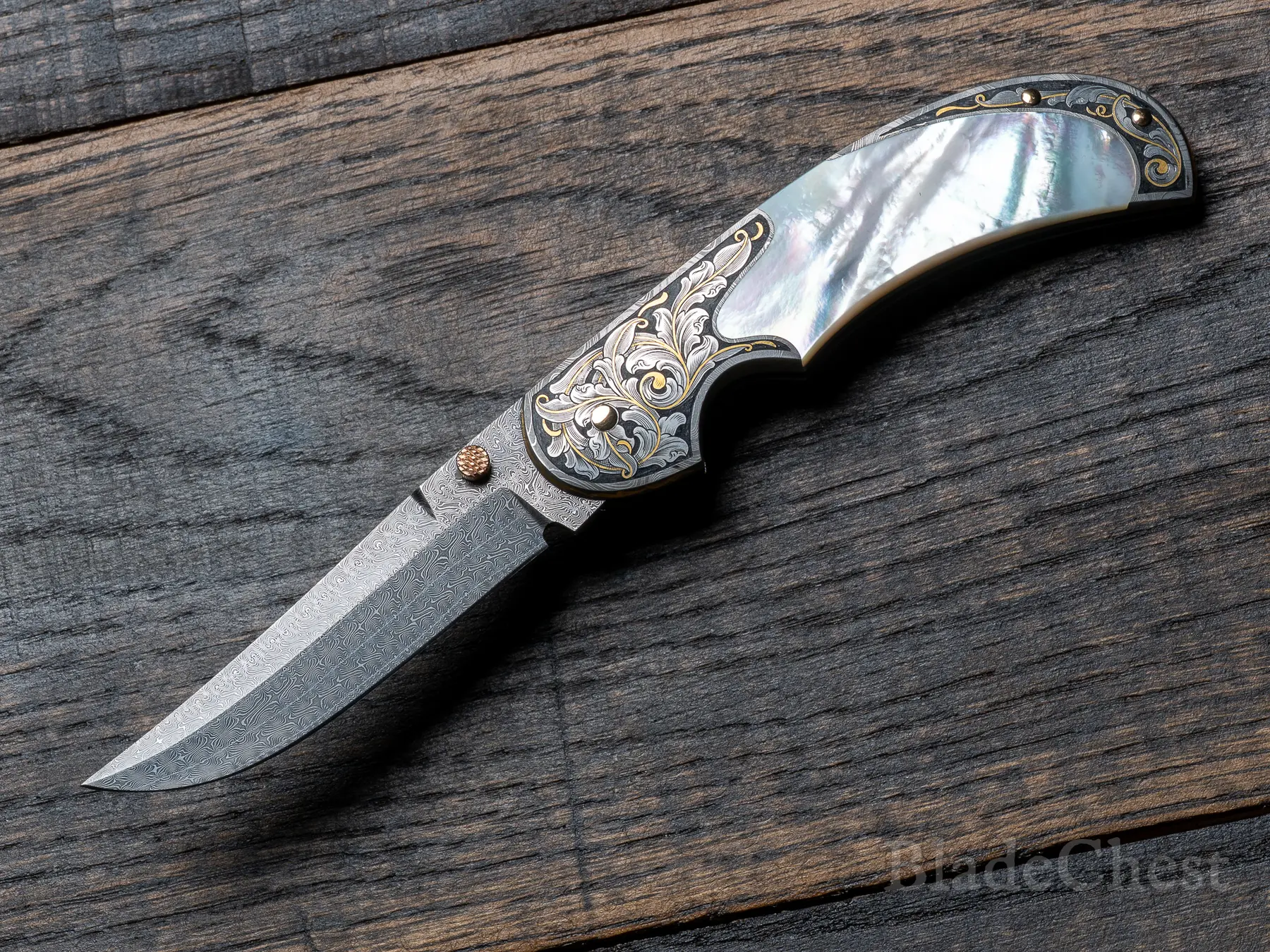 Tom Overeynder / Joe Mason — Persian Damascus folder on dark wood