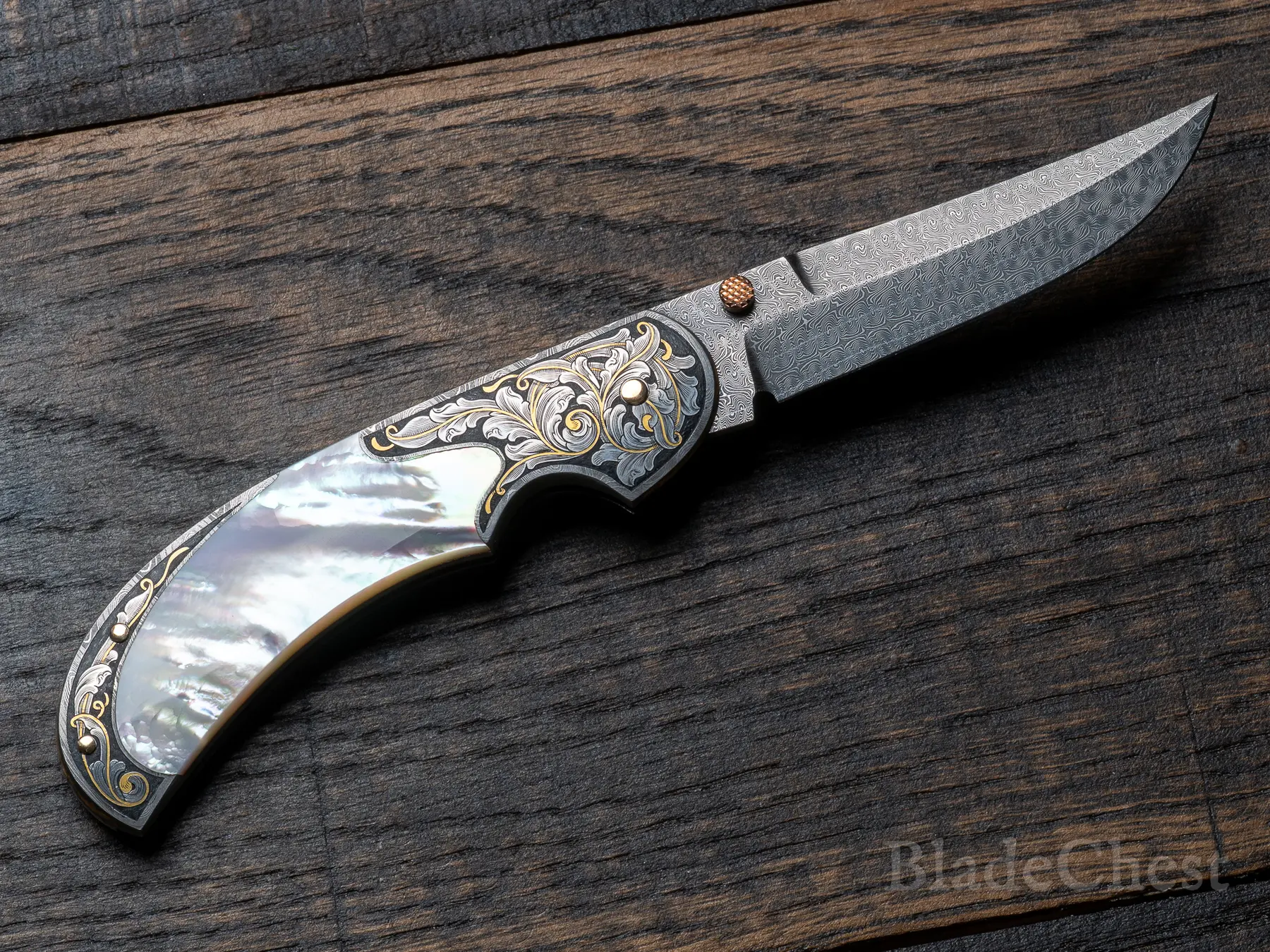 Open — clip side, rear bolster engraving