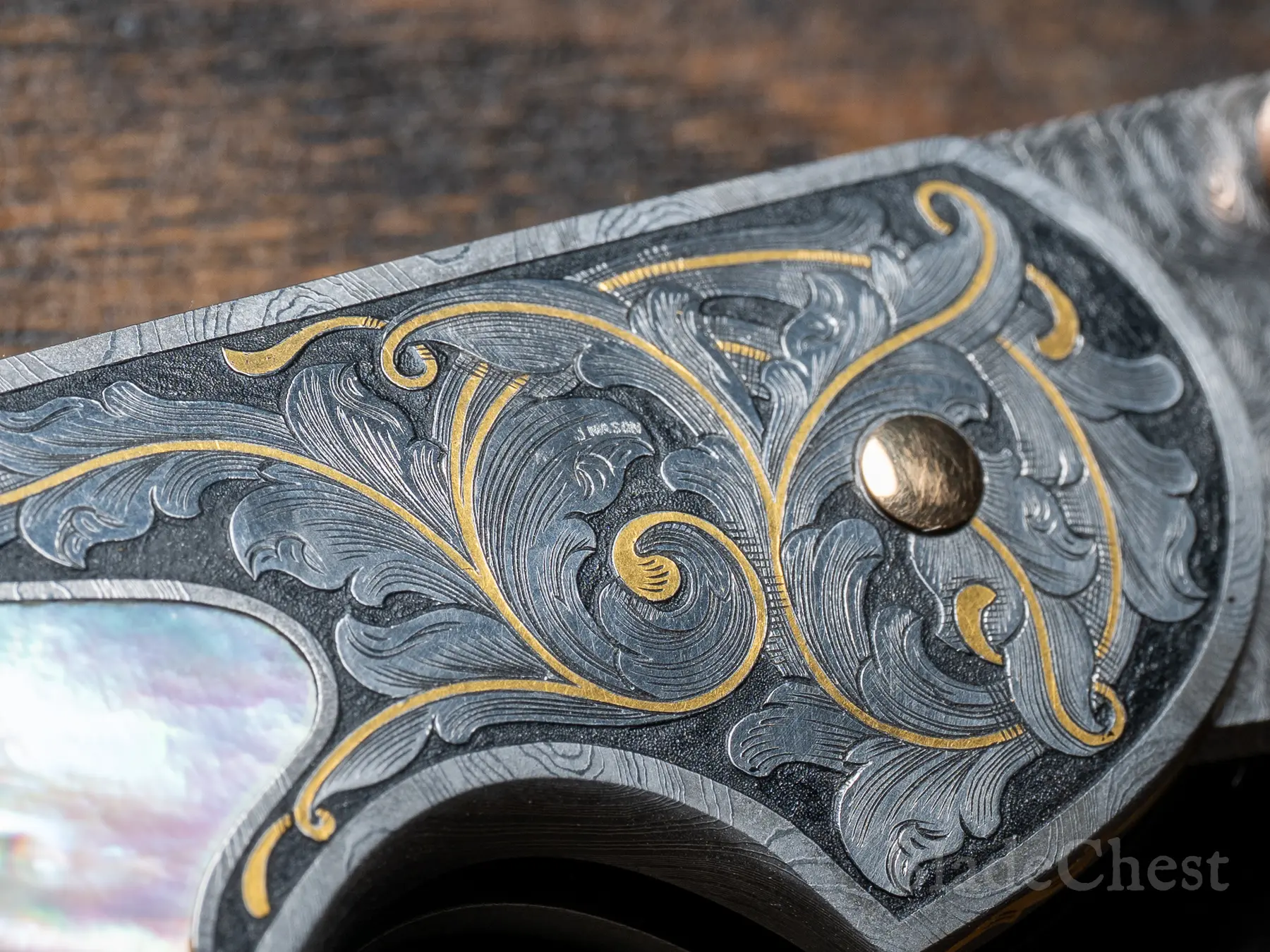 Front bolster — Joe Mason gold inlay engraving, J. Mason signature