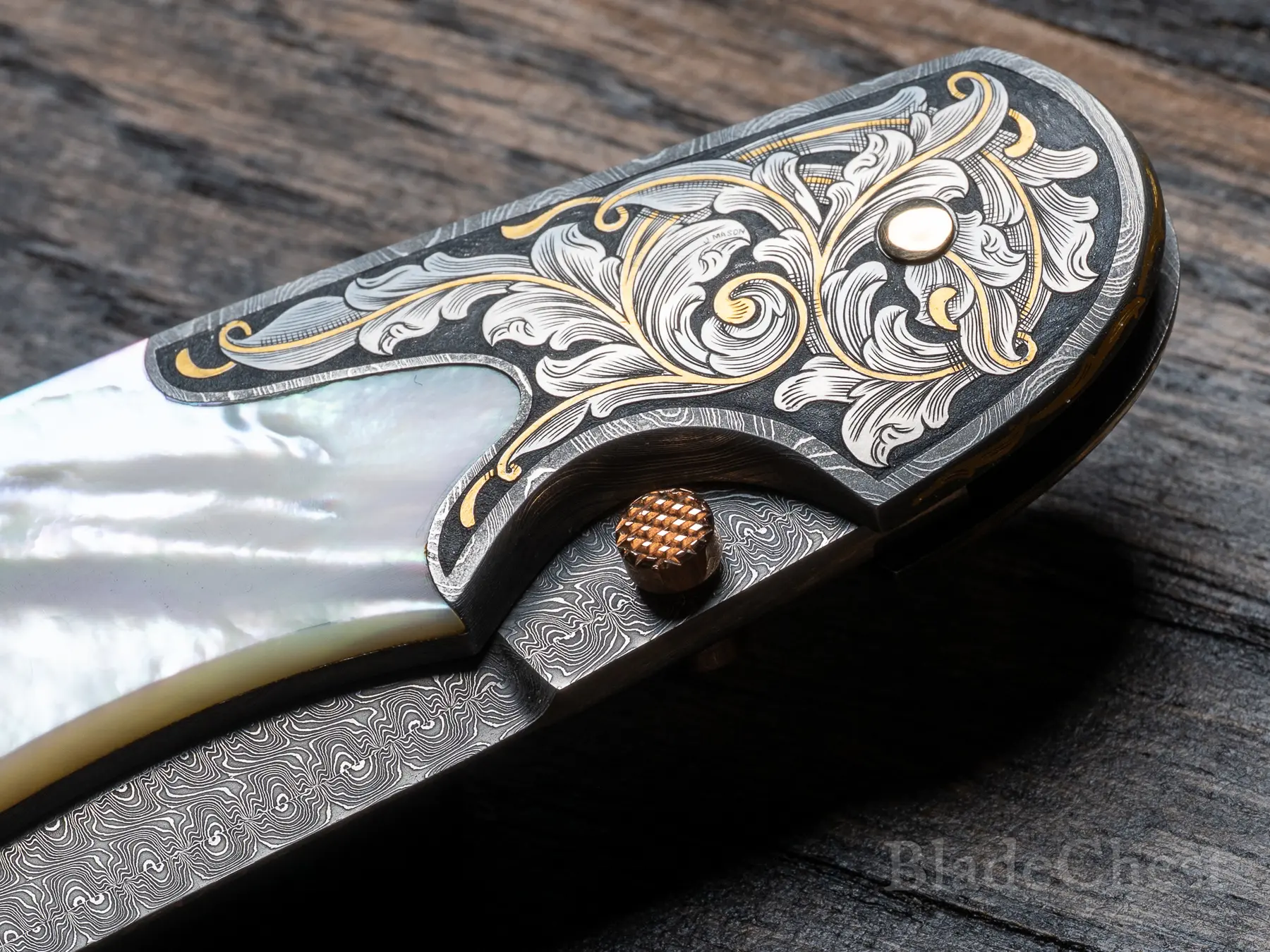 Copper thumbstud — macro, knurled