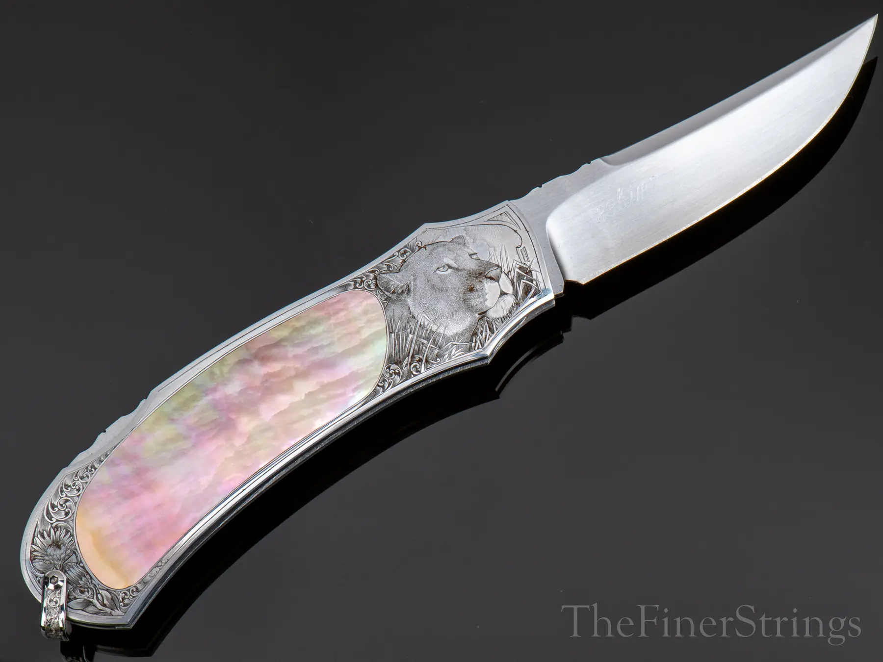 W.D. Pease folder open &mdash; lioness bolster side