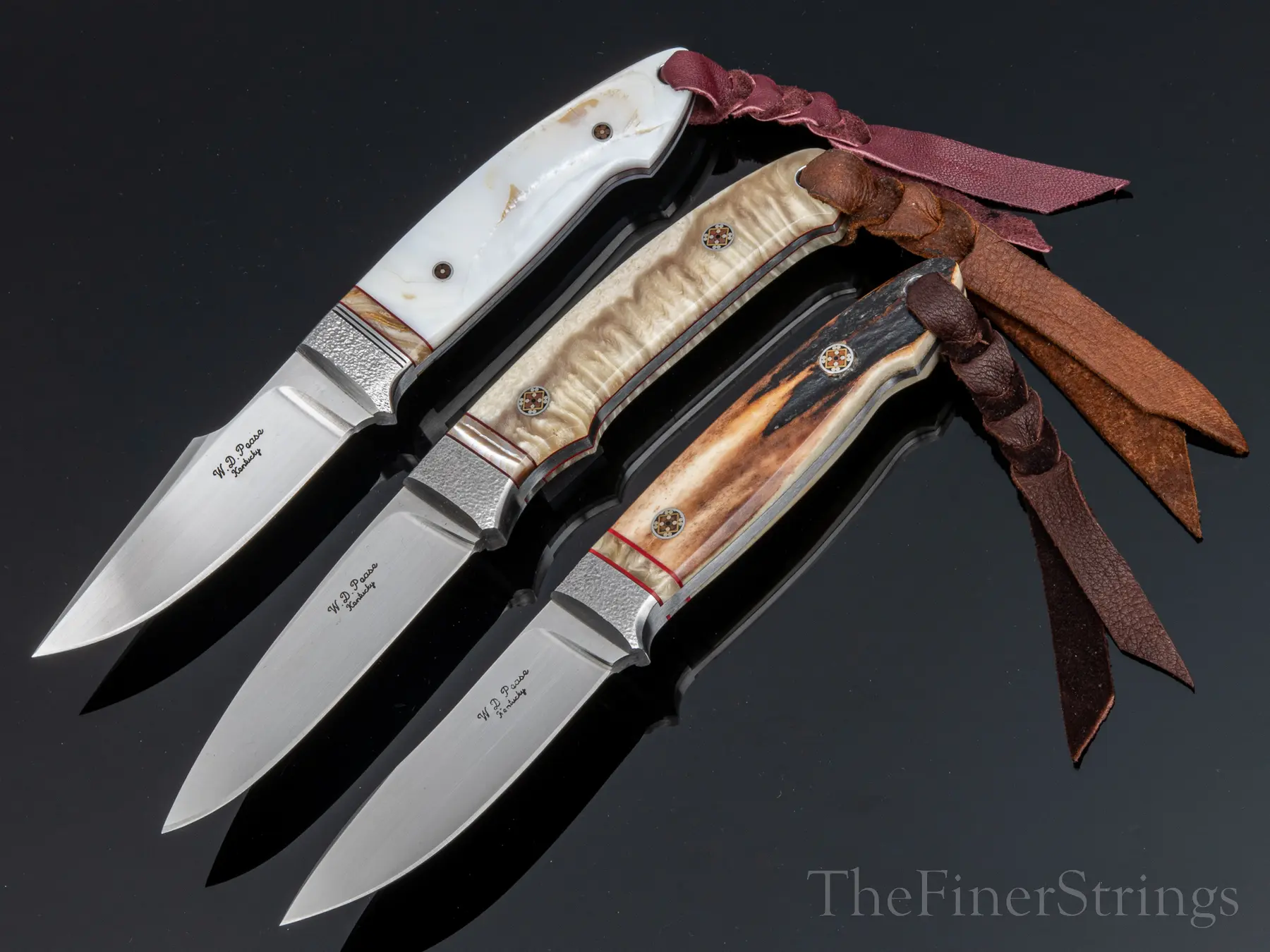 W.D. Pease — three knives with danglers