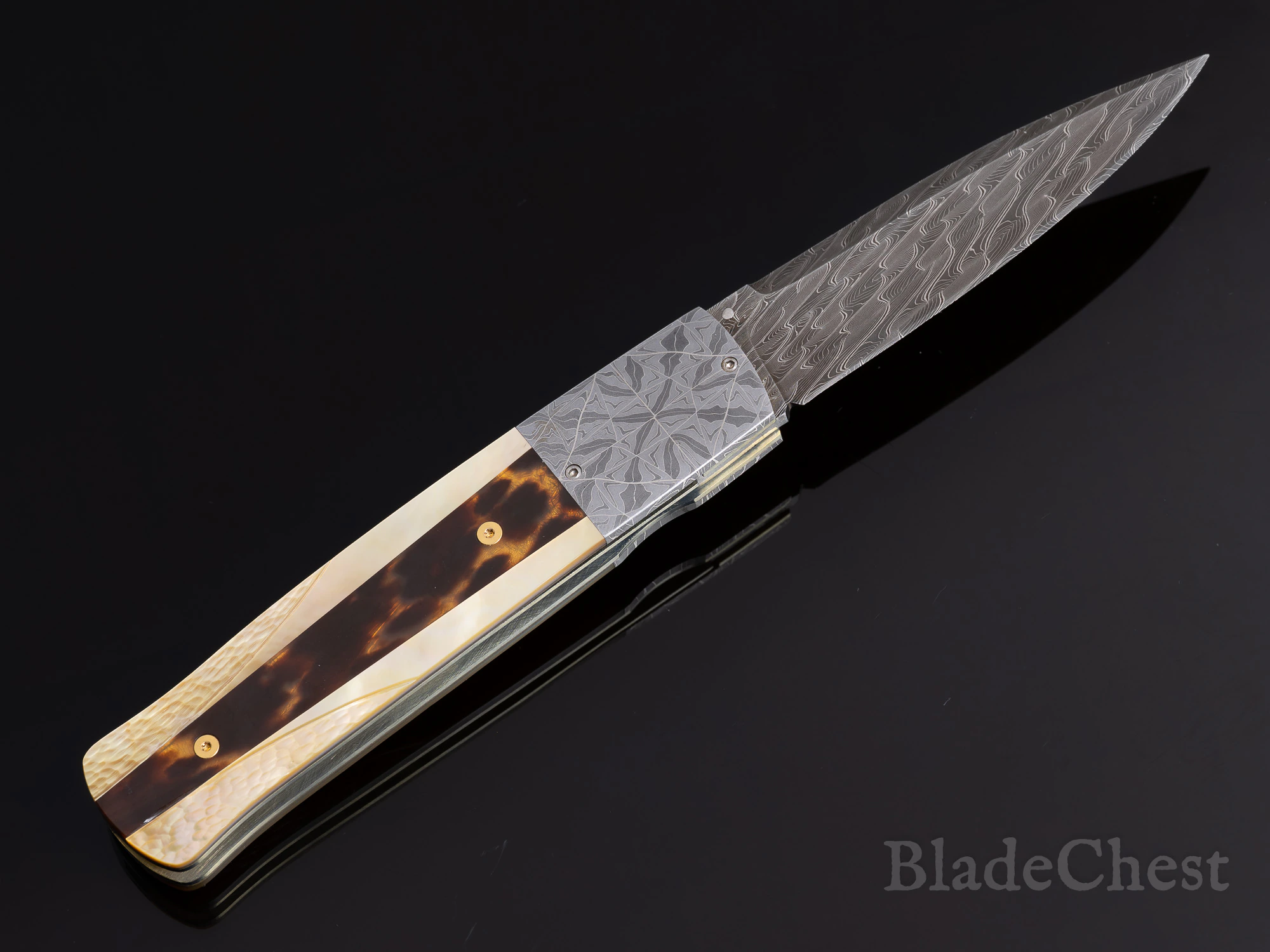 W.D. Pease folder open &mdash; blade forward