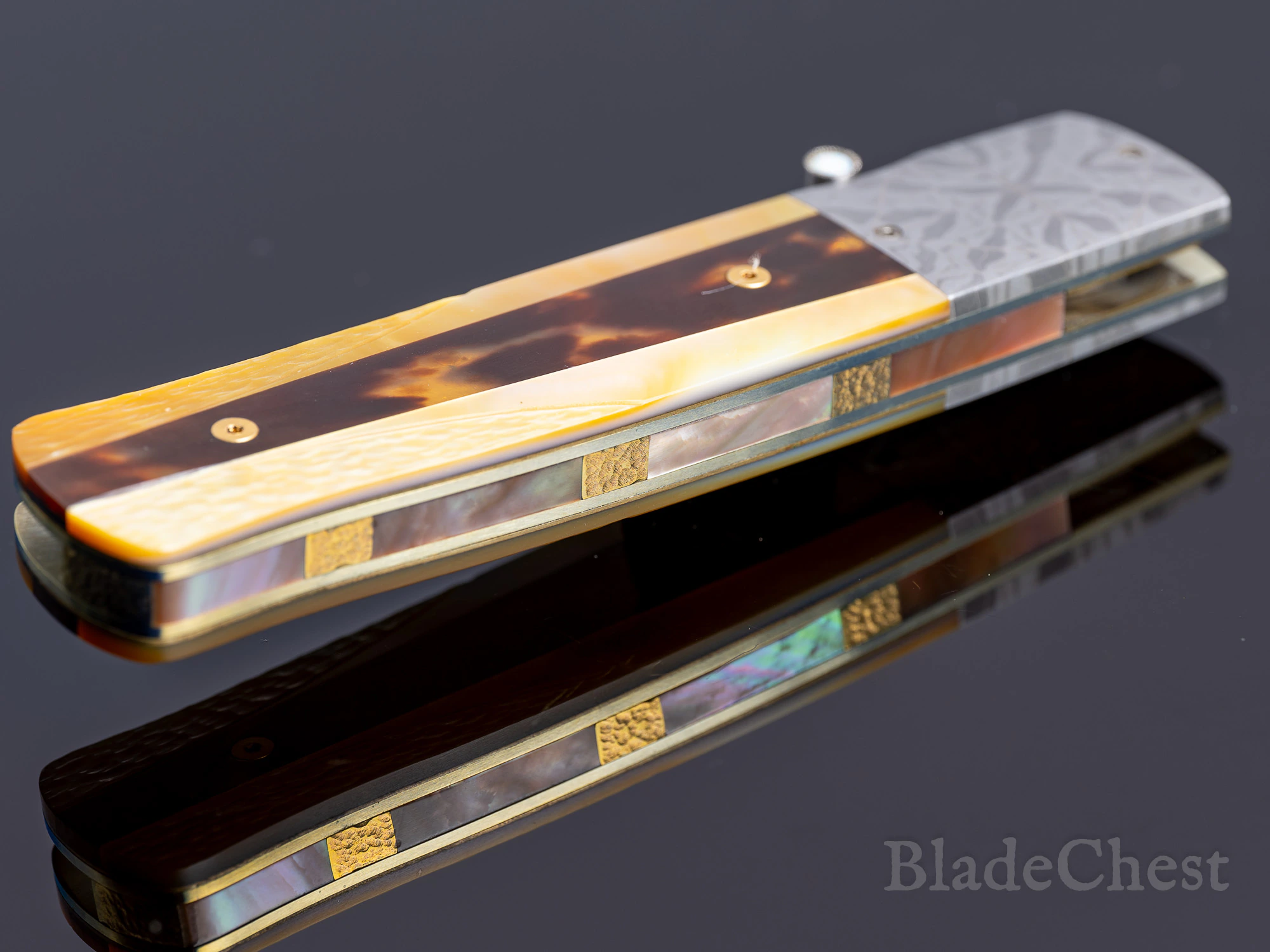 W.D. Pease folder &mdash; pearl and gold inlaid back strap