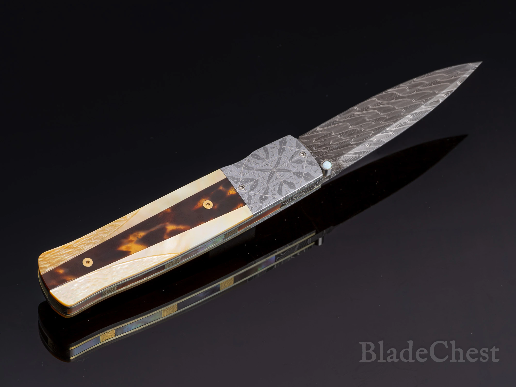 W.D. Pease folder &mdash; gold-lip mother-of-pearl scale